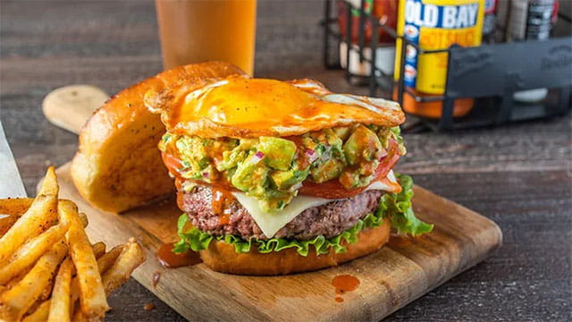 Fiery Old Bay® Hot Sauce Guacamole Burger