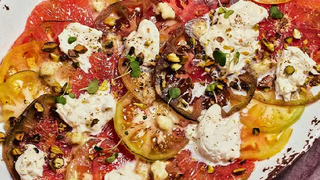 grapefruit tomato carpaccio with yuzu kosho butter