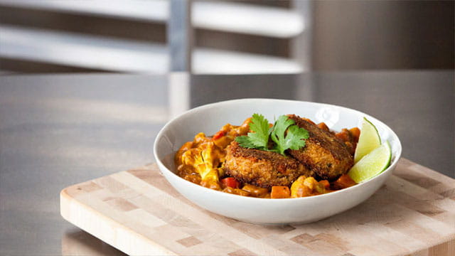 VEGAN SPICY LENTIL RICE CAKE WITH VEGETABLE CURRY