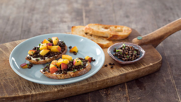 Pickled Peach and Black Beluga Lentil Toasts
