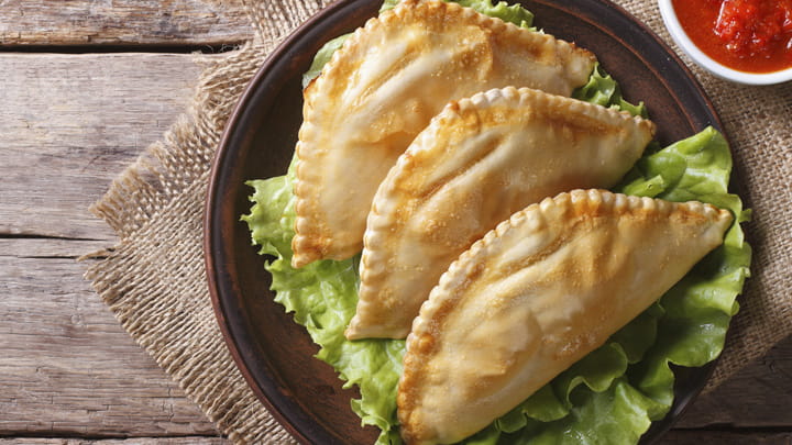 Smoky Pork Empanada with Cholula Chipotle Pico