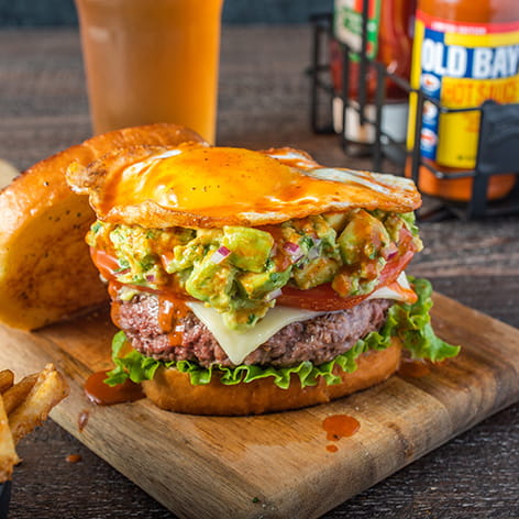 Fiery OLD BAY Hot Sauce Guacamole Burger On Butter Texas Toast