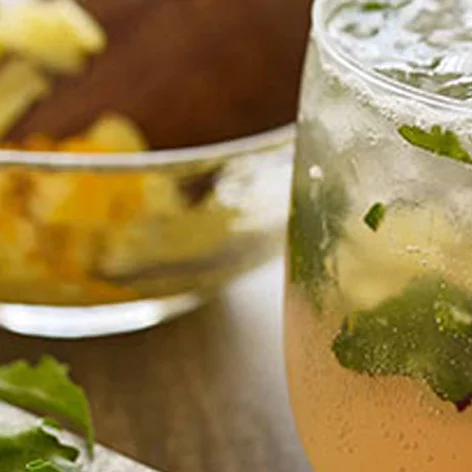 pineapple_turmeric_mocktail_with_muddled_dandelion_greens